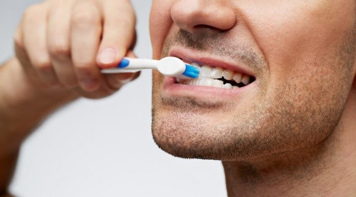 The Pros and Cons of Teeth Whitening Brushing Teeth Hard